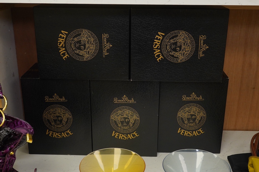 Five boxed Rosenthal for Versace Medusa head champagne glasses in various colours, 17.5cm high. Condition - good.